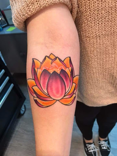 Explore gladiolus tattoo ideas, creative tattoo ideas in Salem, available at Addictions BodyArt Body Piercing & Tattoo