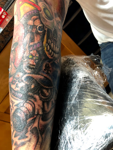 Explore sleeve tattoo fill in ideas, creative tattoo ideas in Okeechobee, available at Muck City Tattoos & Piercings