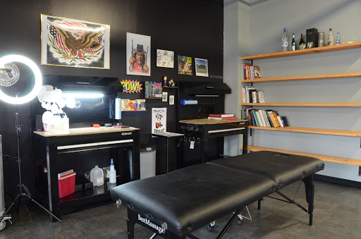 Explore cross with names tattoo ideas, creative tattoo ideas in Clarksville, available at Underdog Tattoo Co