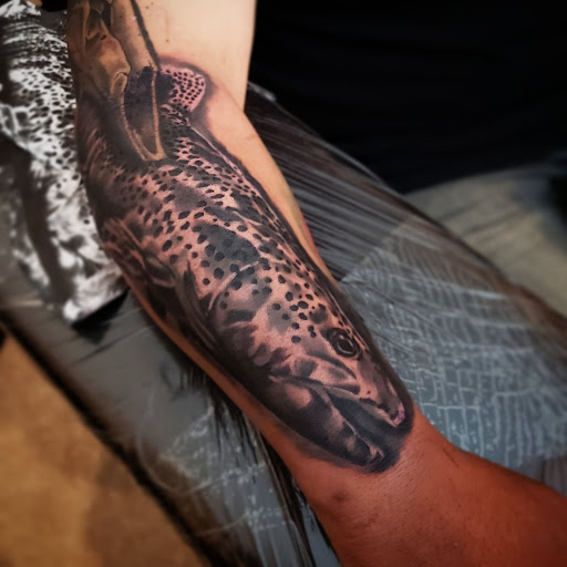 Explore blue tattoo ideas, creative tattoo ideas in Grand Haven, available at Ink Haven Tattoo Studio