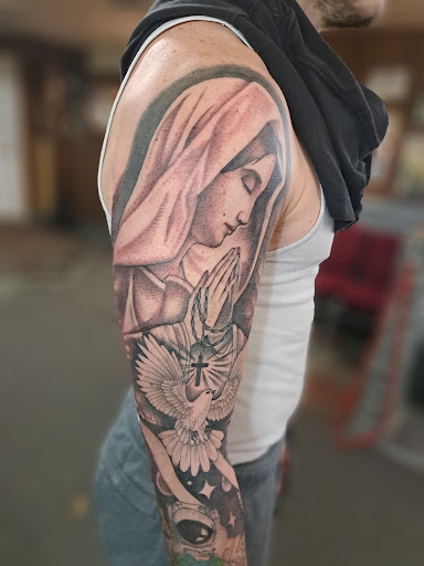 Explore venom tattoo ideas, creative tattoo ideas in Philadelphia, available at Tattoo Odyssey Inc