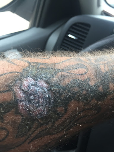 Explore tattoo ideas for law enforcement, creative tattoo ideas in Prudenville, available at Dark Horse Tattoo Studio