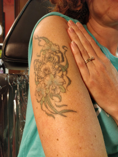 Explore yoga tattoo ideas, creative tattoo ideas in Grand Rapids, available at Anarchy Ink Tattoos LLC