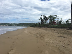Espinar beach East'in fotoğrafı geniş bir kıyı şeridi ile birlikte