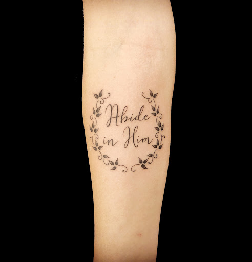 Explore female neck tattoo ideas, creative tattoo ideas in Peoria, available at Freedom Ink Tattoos