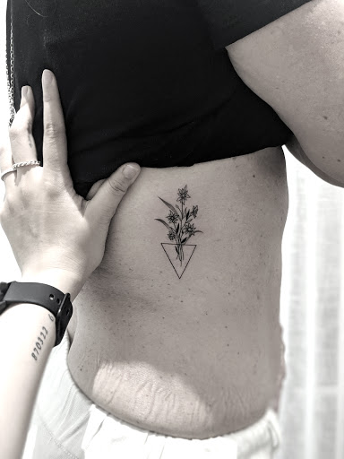 Explore back thigh tattoo ideas, creative tattoo ideas in Los Angeles, available at K Tattoo