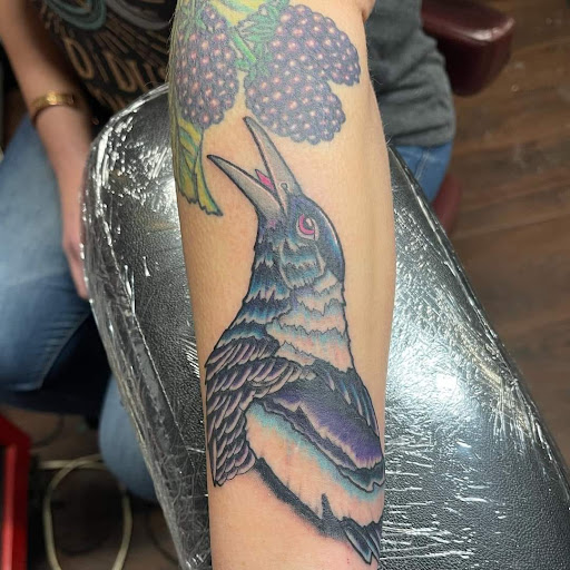 Explore neck word tattoo ideas, creative tattoo ideas in Riverton, available at Pure Quill Tattoo