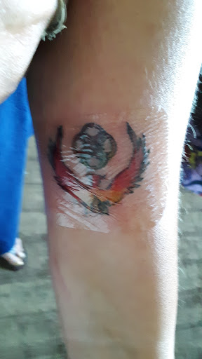 Explore side arm tattoo ideas, creative tattoo ideas in Sioux City, available at Addictive Tattoo-Piercing