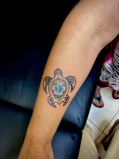 Explore teaching tattoo ideas, creative tattoo ideas in Honolulu, available at Sacred Art Tattoo Waikiki