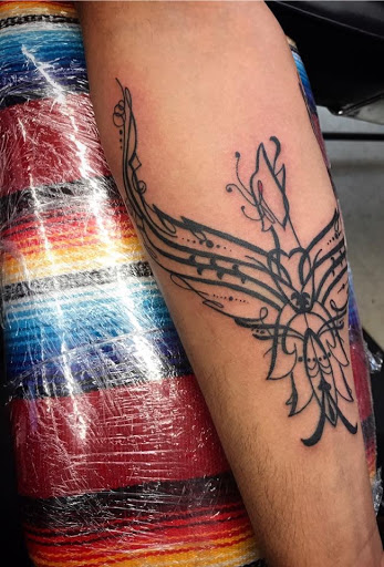 Explore lion family tattoo ideas, creative tattoo ideas in San Antonio, available at Nite Owl Tattoo Studio