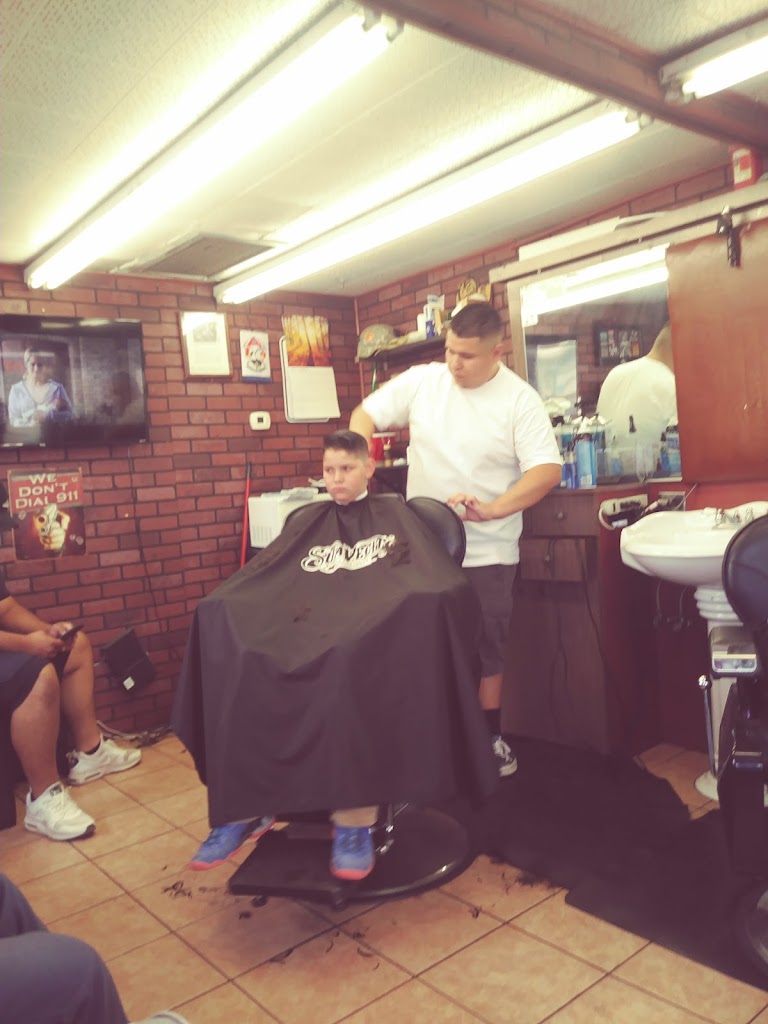 Uptowners Barber Shop 92311