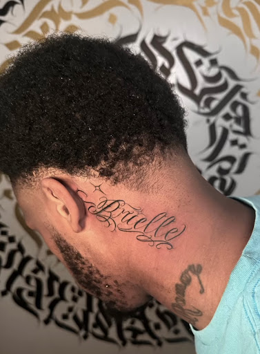 Explore tattoo handwriting ideas, creative tattoo ideas in Baltimore, available at Rippd Canvas Tattoo Shop Artists Social Club