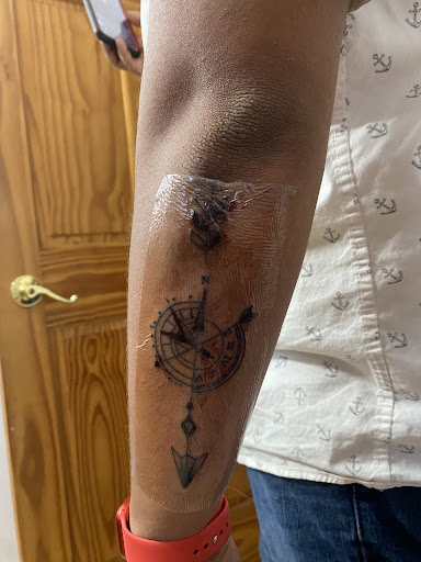 Explore love heart tattoo ideas, creative tattoo ideas in Platteville, available at Legacy Impressions Tattoos & Piercings
