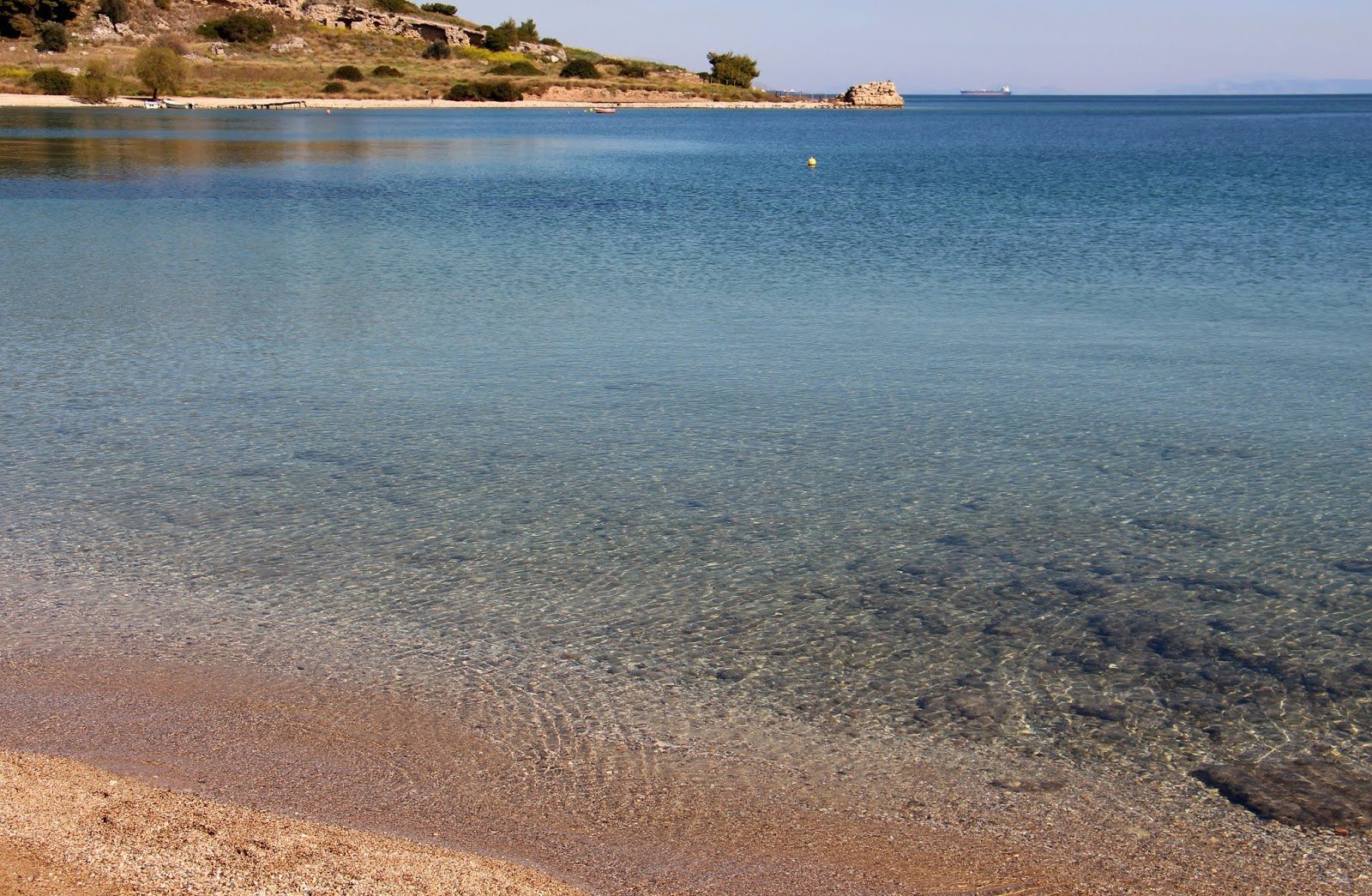 Photo of Paralia Kechrion with turquoise pure water surface
