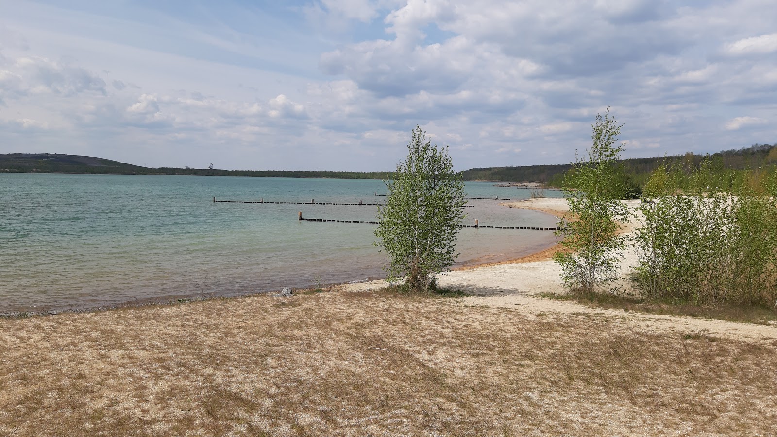 Foto von Strand Stormthal mit türkisfarbenes wasser Oberfläche