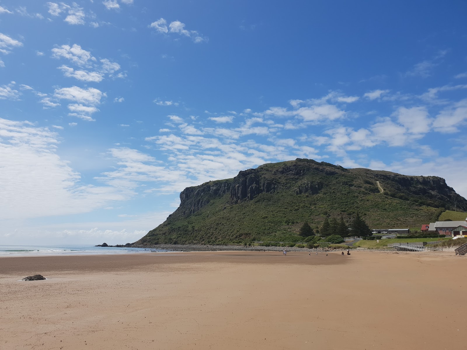 Foto van Godfreys Beach met hoog niveau van netheid