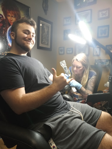 Explore half sleeve flower tattoo ideas, creative tattoo ideas in Roanoke, available at Asylum Studios