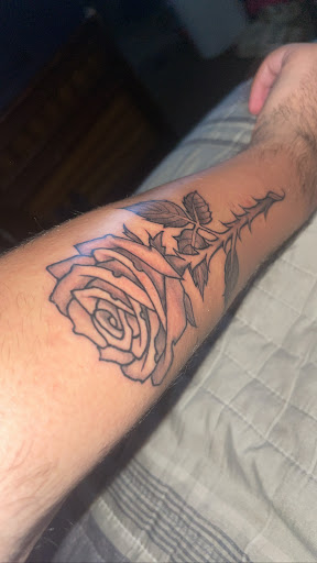 Explore inner bicep tattoo ideas for men, creative tattoo ideas in Vista, available at American Tattoo Vista