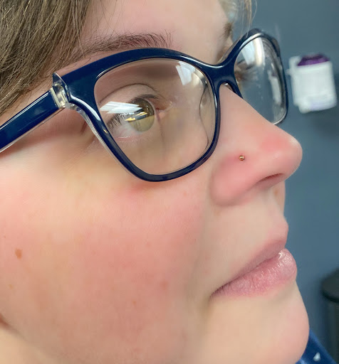 Explore cross tattoo idea, creative tattoo ideas in Springfield, available at Body Piercing By Qui Qui