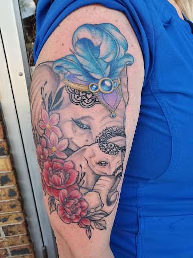 Explore giving tree tattoo ideas, creative tattoo ideas in Peoria, available at Guerrilla Ink Tattoos