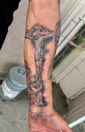 Explore tattoo ideas for covering up name, creative tattoo ideas in Saint Petersburg, available at Cthulhu Tattoo & Body Piercing