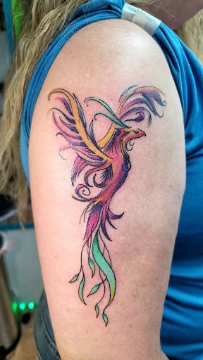 Explore gremlin tattoo ideas, creative tattoo ideas in Decatur, available at Exclusive Ink Tattoos & Body Piercings 22nd & Wood