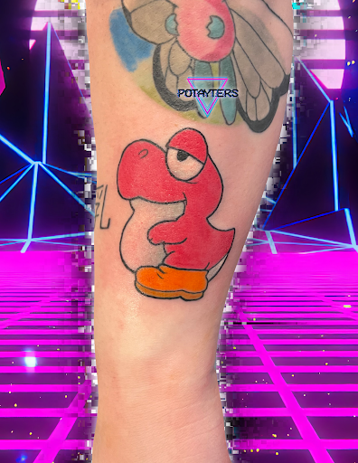 Explore belly tattoo ideas, creative tattoo ideas in Palm Harbor, available at Angry Owl Tattoo and Piercing