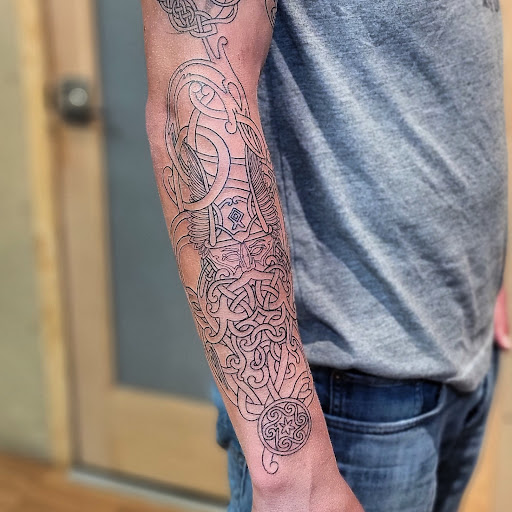 Find best back tattoo ideas for your next unique tattoo in Carbondale at Bonedale Tattoo