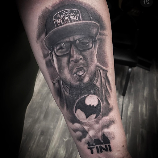 Explore back of neck tattoo ideas, creative tattoo ideas in Goose Creek, available at Red Kirin Tattoo