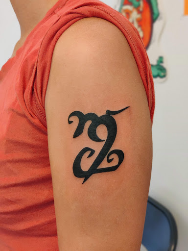 Explore pistol tattoo ideas, creative tattoo ideas in Hebron, available at Explosive Ink Tattoo