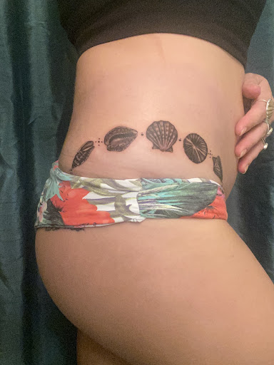 Explore lady thigh tattoo ideas, creative tattoo ideas in Kailua Kona, available at Packing Ink Tattoos