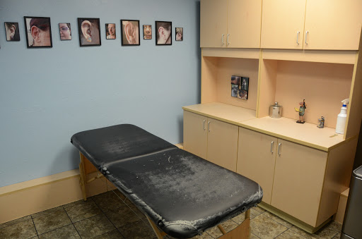 Tattoo Shop «Lucky Rabbit Tattoos», reviews and photos, 611 E McGalliard Rd, Muncie, IN 47303, USA