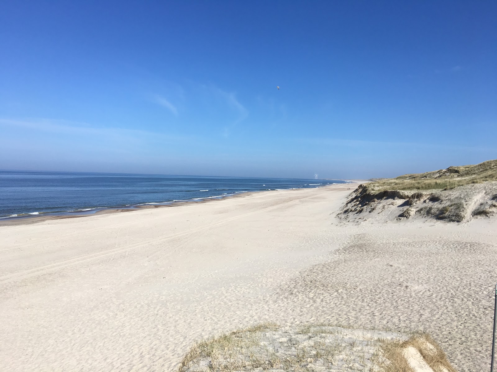 Foto av Skodbjerge Beach med beige sand yta