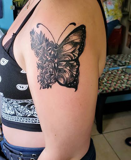 Explore trapped tattoo ideas, creative tattoo ideas in Englewood, available at The Original Big Daddy Tattoo & Body Piercing est.1997 est.1997