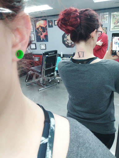 Explore maltese cross tattoo ideas, creative tattoo ideas in Liberty, available at Bulletproof Tiger Social Club