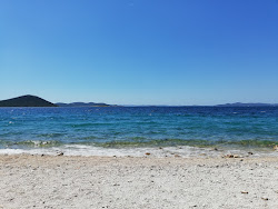 Foto von Buqez beach und die siedlung