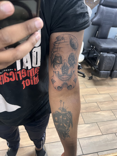 Explore flower vine tattoo ideas, creative tattoo ideas in Fort Pierce, available at Goodfellas Tattoo & Body Piercing