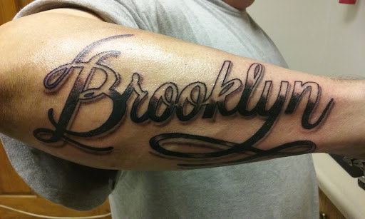 Explore unity tattoo ideas, creative tattoo ideas in Albany, available at Tom Spaulding Tattoo And Body Piercing Studio