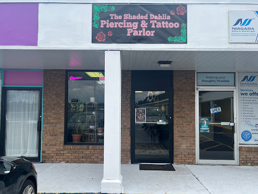 Explore bonnie and clyde tattoo ideas, creative tattoo ideas in Grand Island, available at The Shaded Dahlia Piercing & Tattoo Parlor