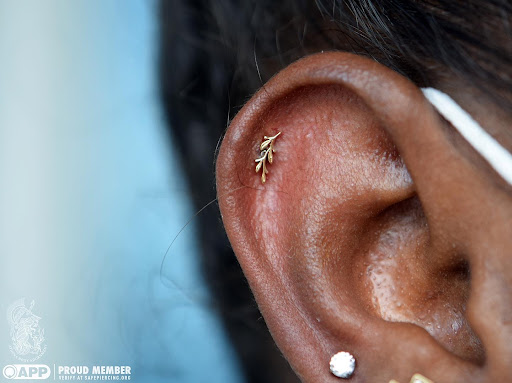 Explore cross tattoo cover up ideas, creative tattoo ideas in Pompano Beach, available at Athena Body Adornment