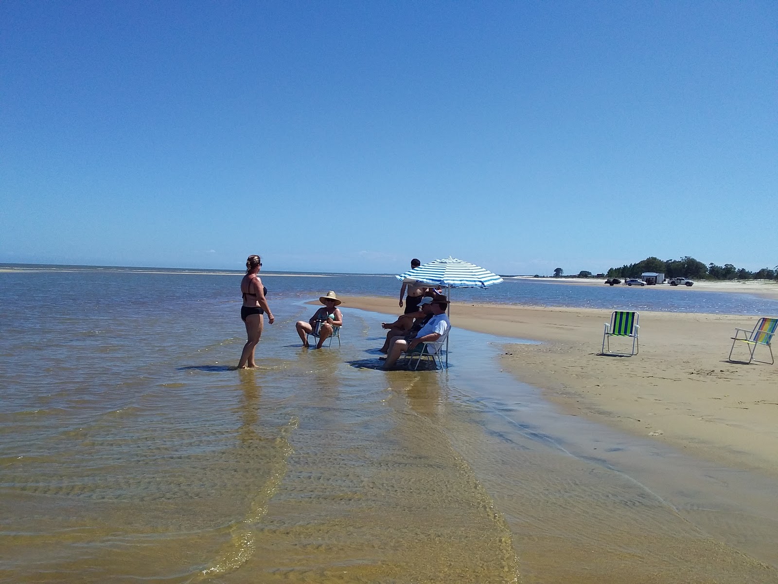 Foto von Balneario Lagoa Dos Patos Beach wilde gegend