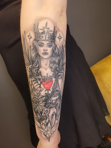 Explore street signs tattoo ideas, creative tattoo ideas in Anniston, available at Lucid Dreams Tattoos and Piercings