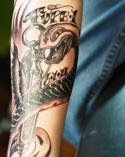 Explore ideas for a tattoo for my son, creative tattoo ideas in Springfield, available at Poke and a Rub art studio