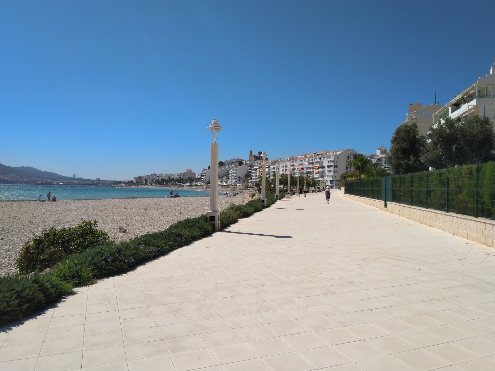Photo de Platja de l'Espigo avec baie spacieuse