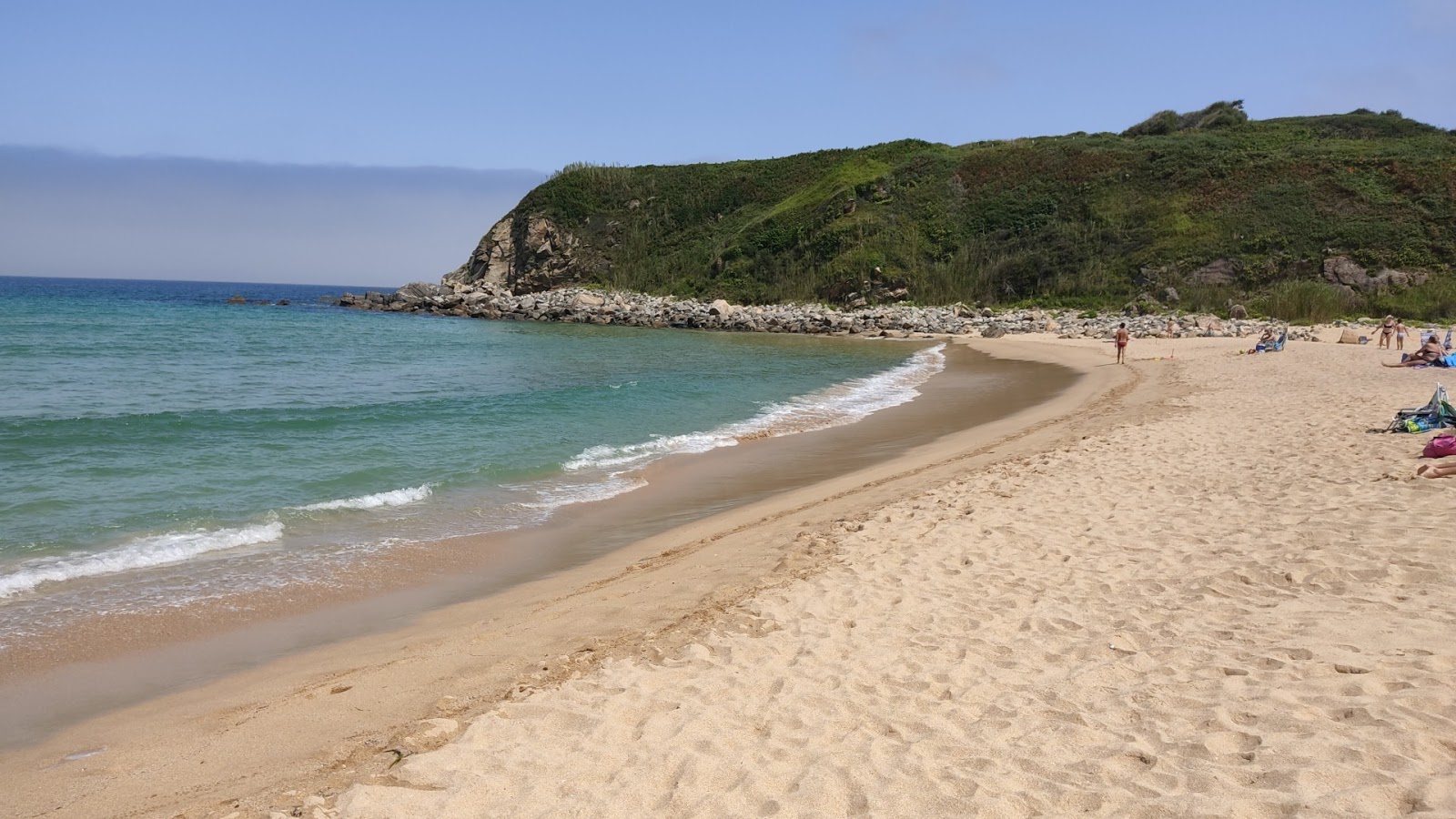 Foto de Playa de Esteiro com areia bege fina superfície