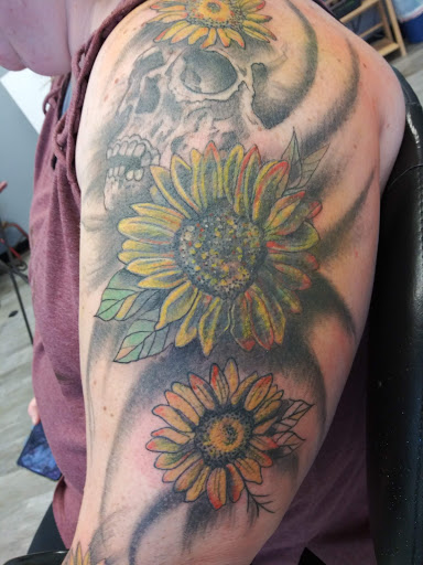 Explore fern tattoo ideas, creative tattoo ideas in La Crosse, available at La Crosse Tattoo