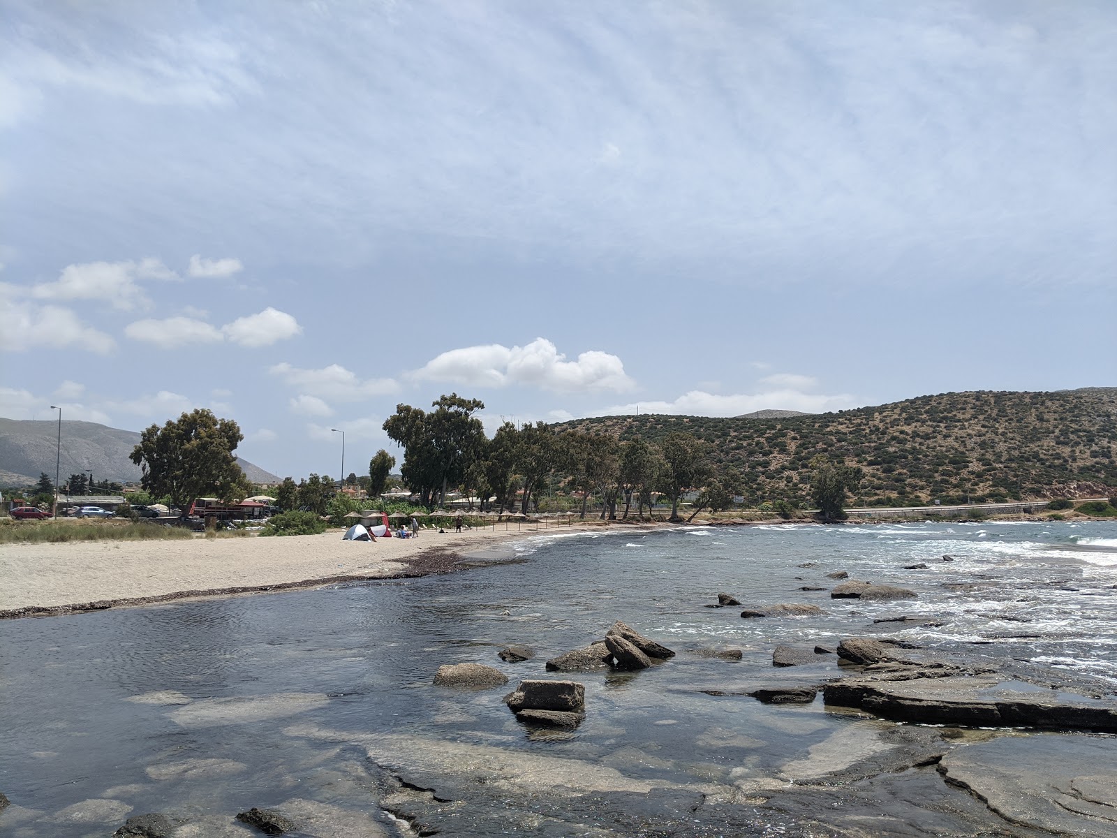 Φωτογραφία του Glystra Lagonísi με καθαρό πράσινο νερό επιφάνεια