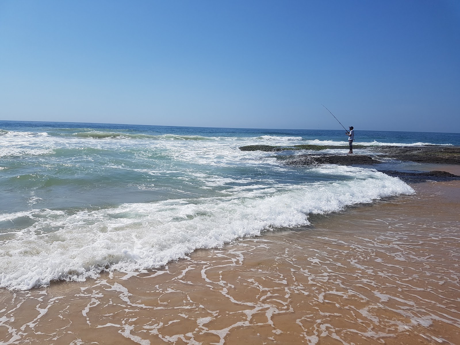 Foto von Pedrinhas Strand - beliebter Ort unter Entspannungskennern