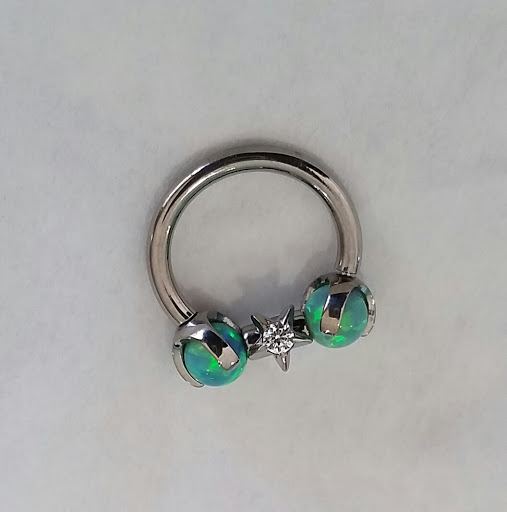 Explore rush tattoo ideas, creative tattoo ideas in Kearney, available at Studio 5150 Piercing & Fine Jewelry