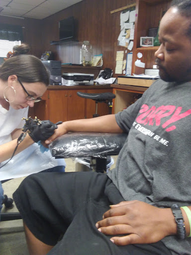 Explore country music tattoo ideas, creative tattoo ideas in Elizabeth City, available at Wolfs Den Custom Tattoo & Body Piercing Studio